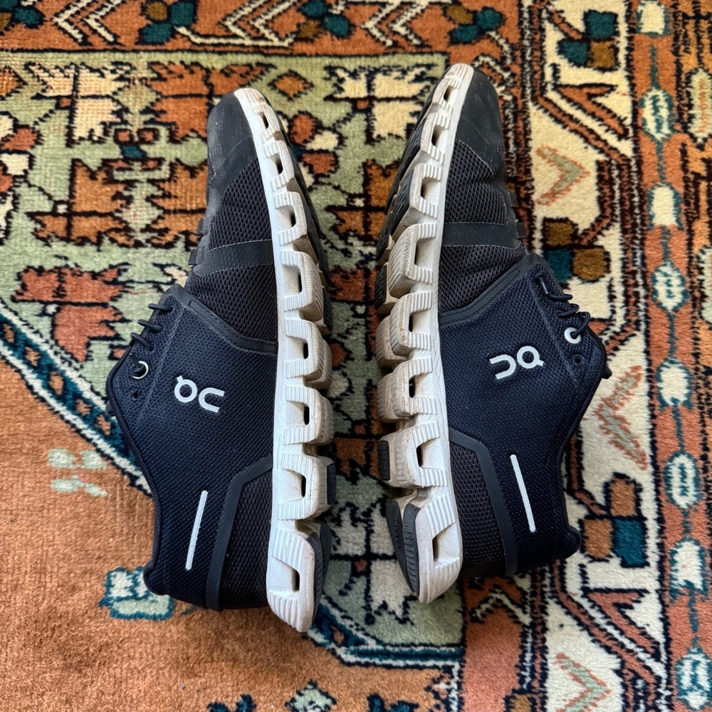 On cloud shoes, size W9